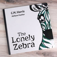 The Lonely Zebra Book by C.M. Harris - Aerial Shot of Book Cover